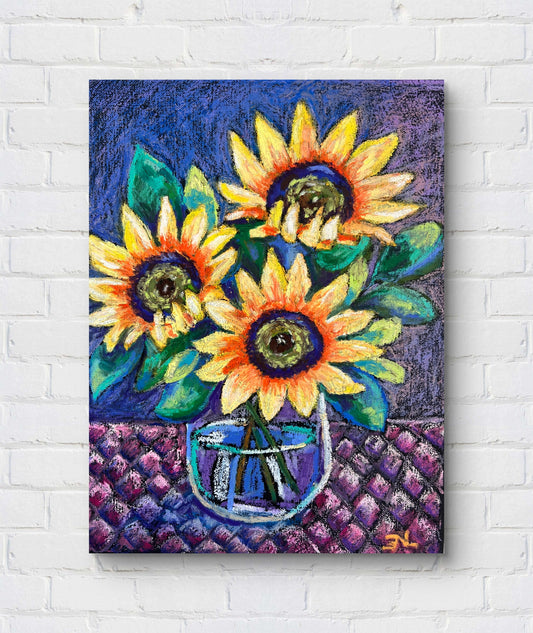 Colorful painting of sunflowers in a vase on a white brick wall.