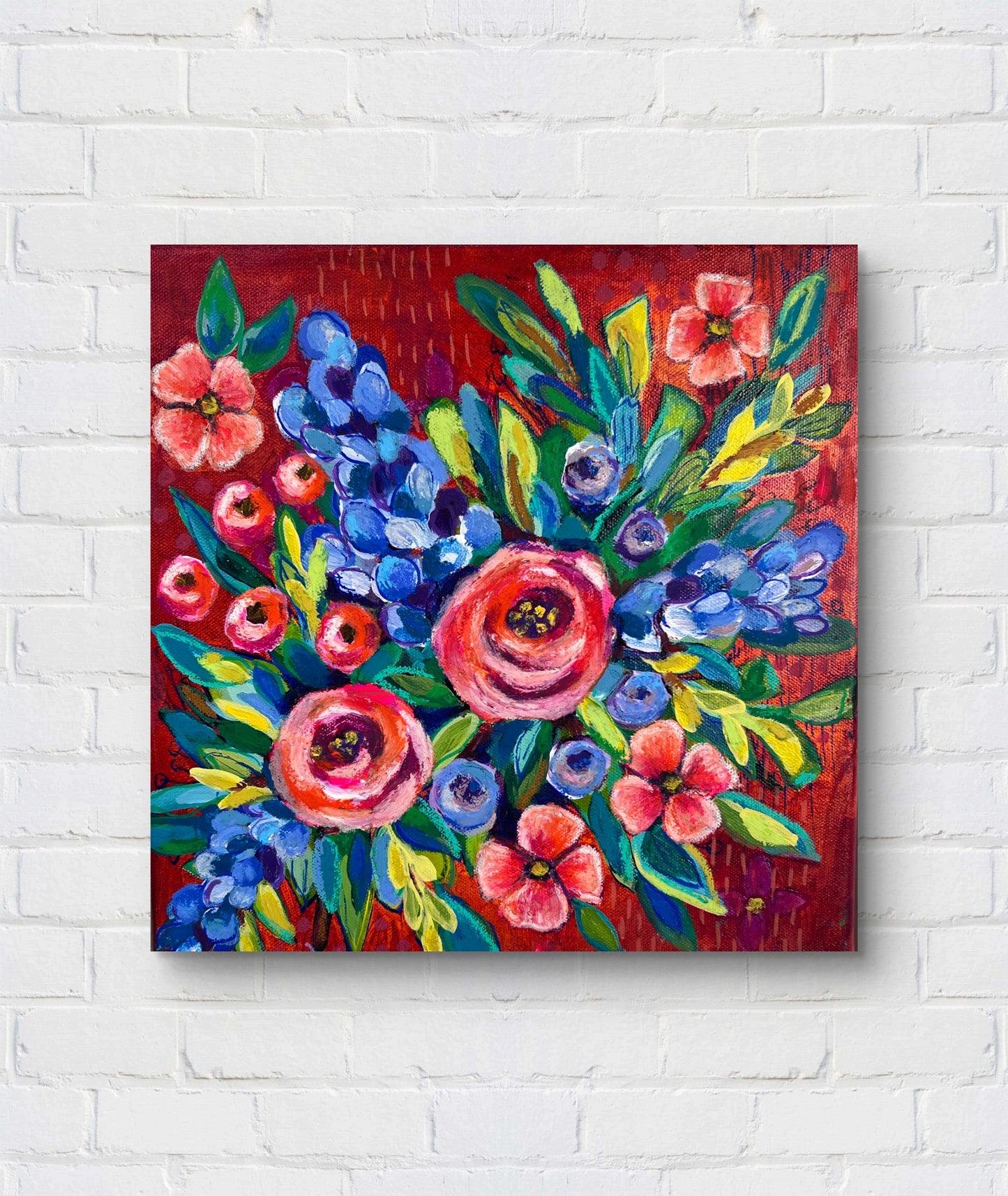 Colorful floral painting on a white brick wall