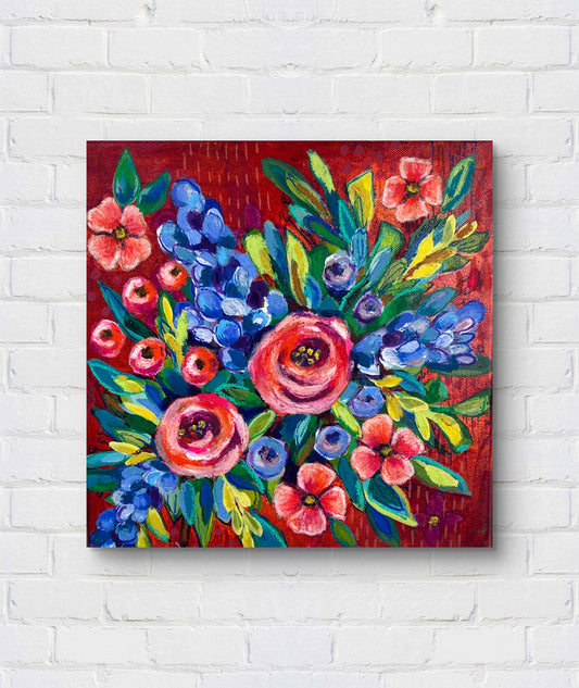 Colorful floral painting on a white brick wall
