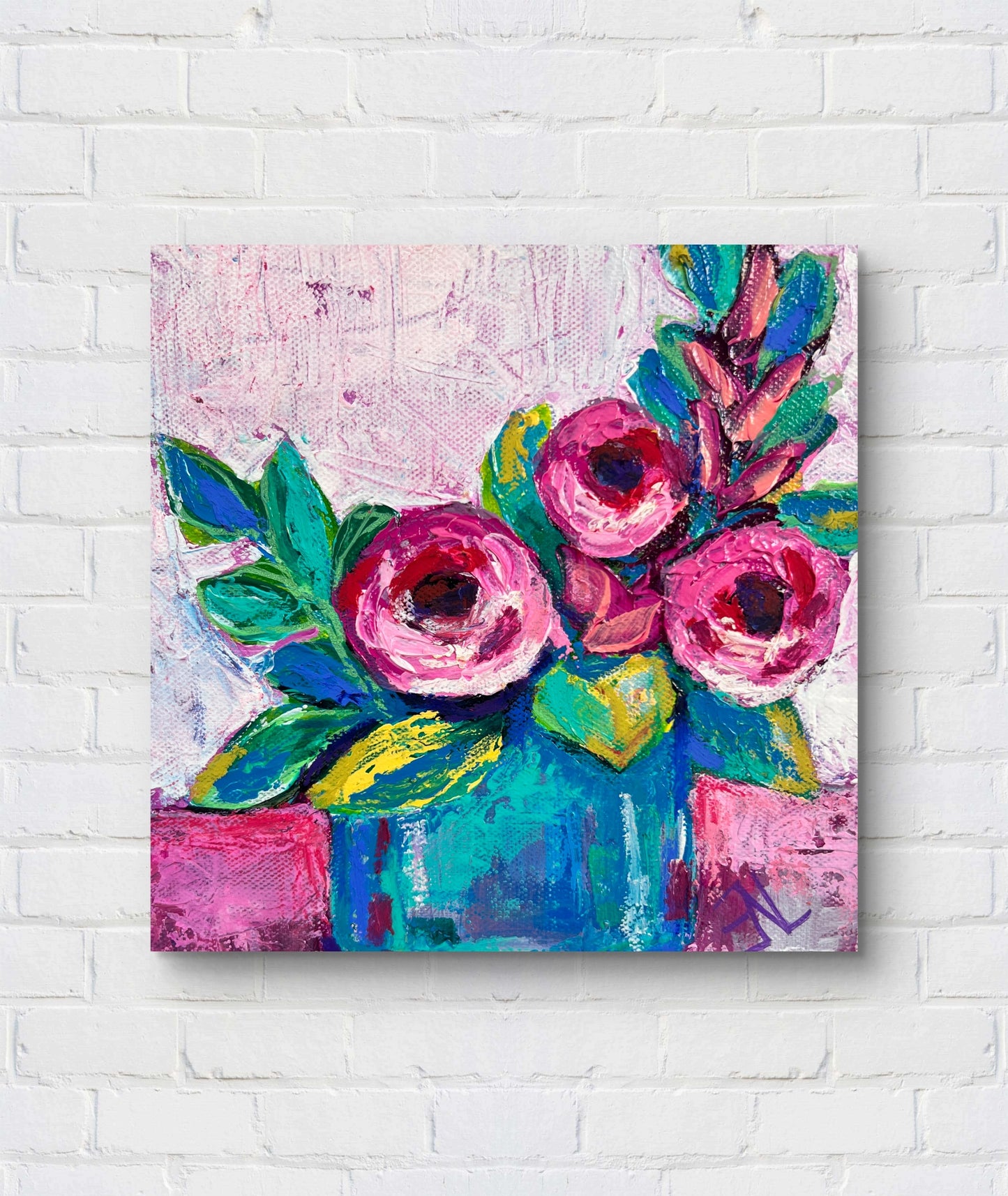 Colorful floral painting on a white brick wall